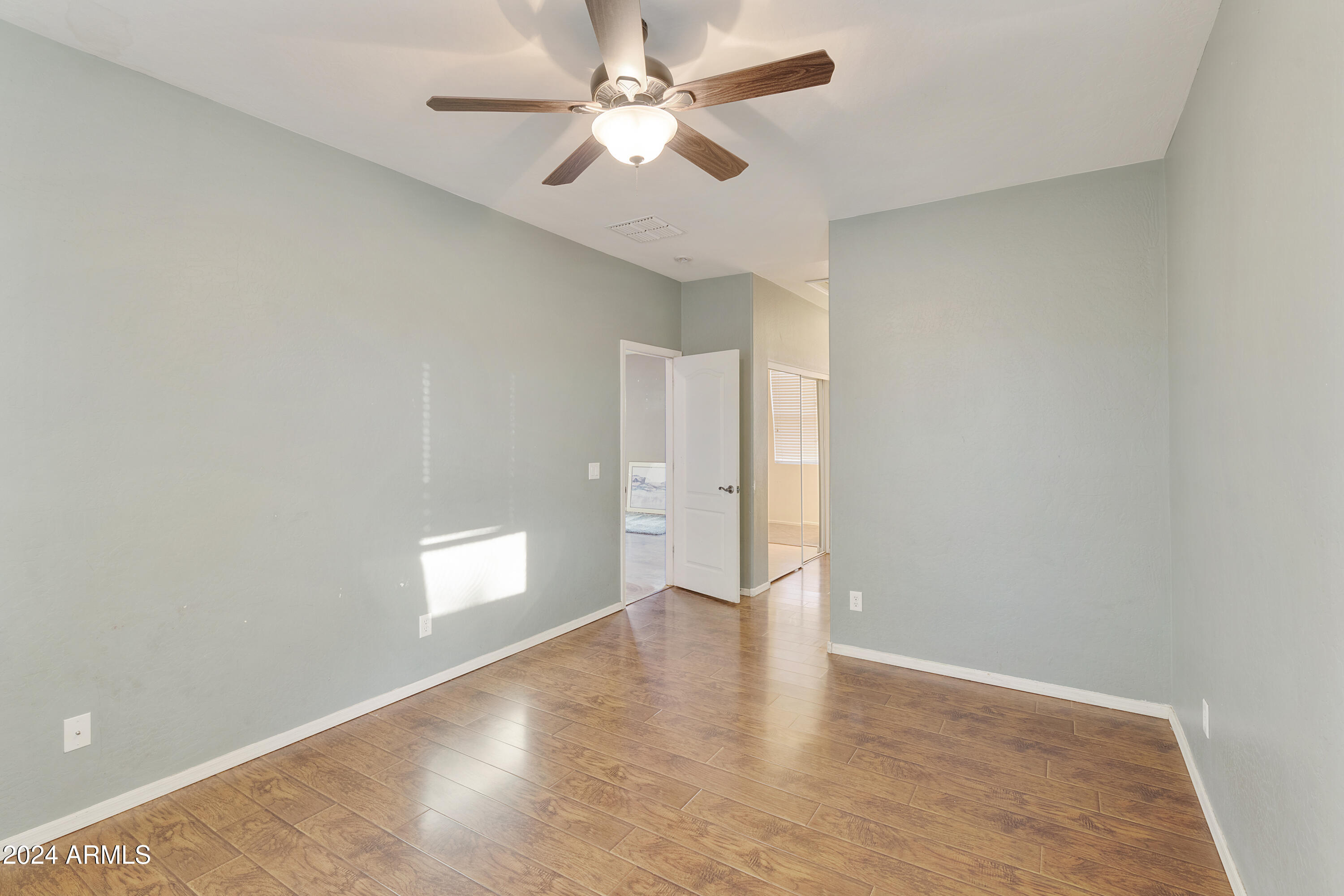 4232 East Tyson Street Gilbert, AZ 85295 - Photo 12 of 38 a view of an empty room with a window