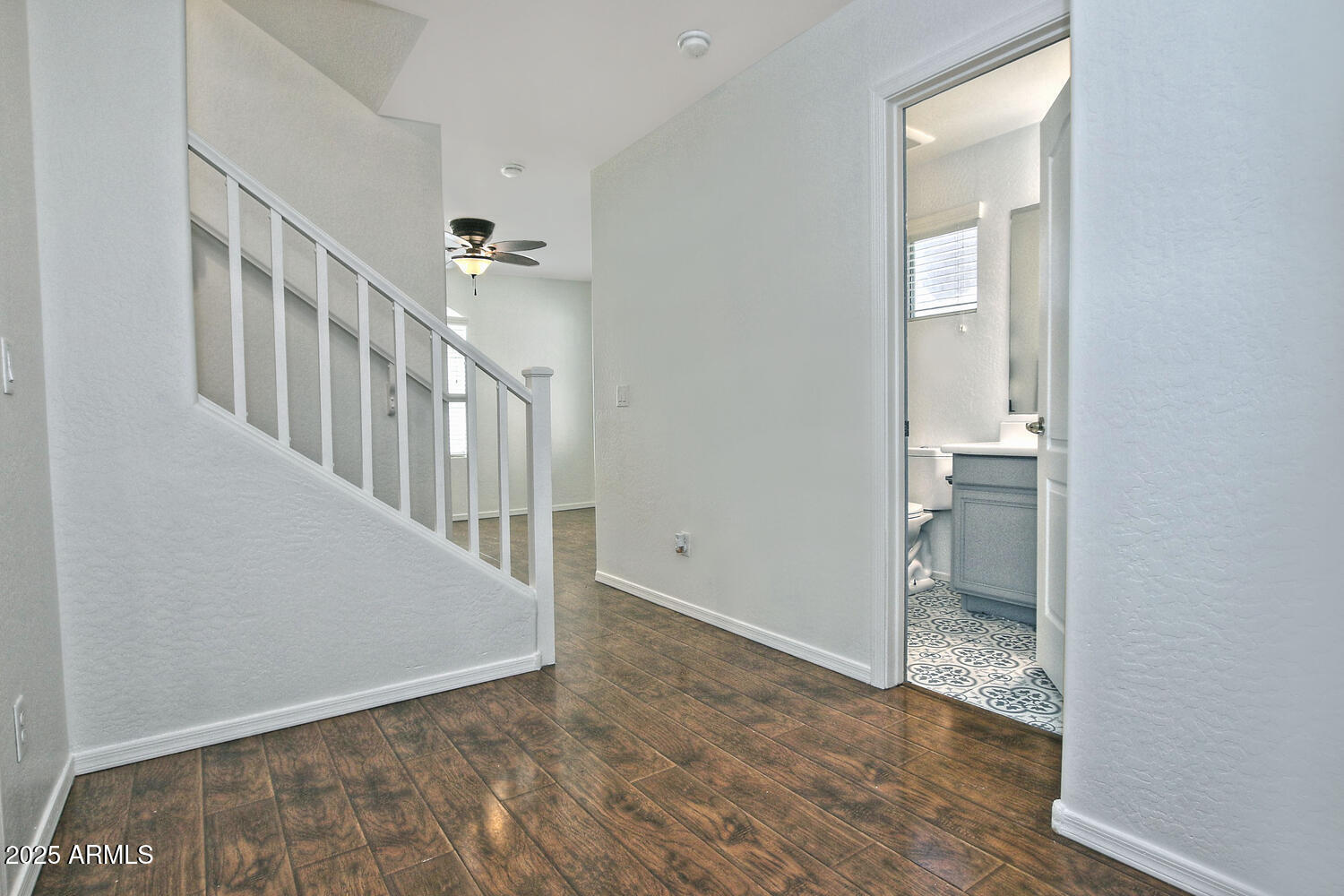4232 East Tyson Street Gilbert, AZ 85295 - Photo 19 of 38 a view of an entryway with wooden floor