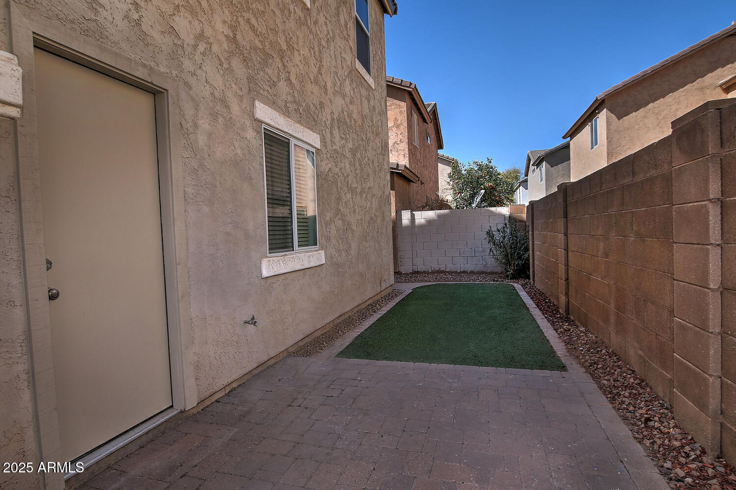4232 East Tyson Street Gilbert, AZ 85295 - Photo 29 of 38 a view of a back yard of the house
