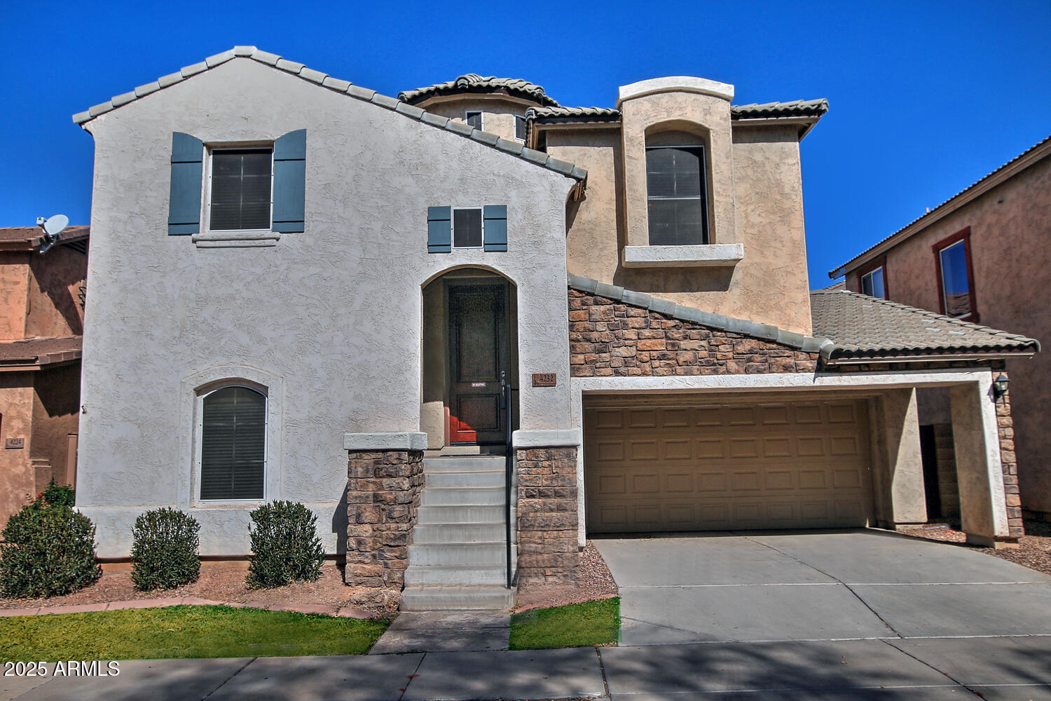 4232 East Tyson Street Gilbert, AZ 85295 - Photo 2 of 38 a front view of a house