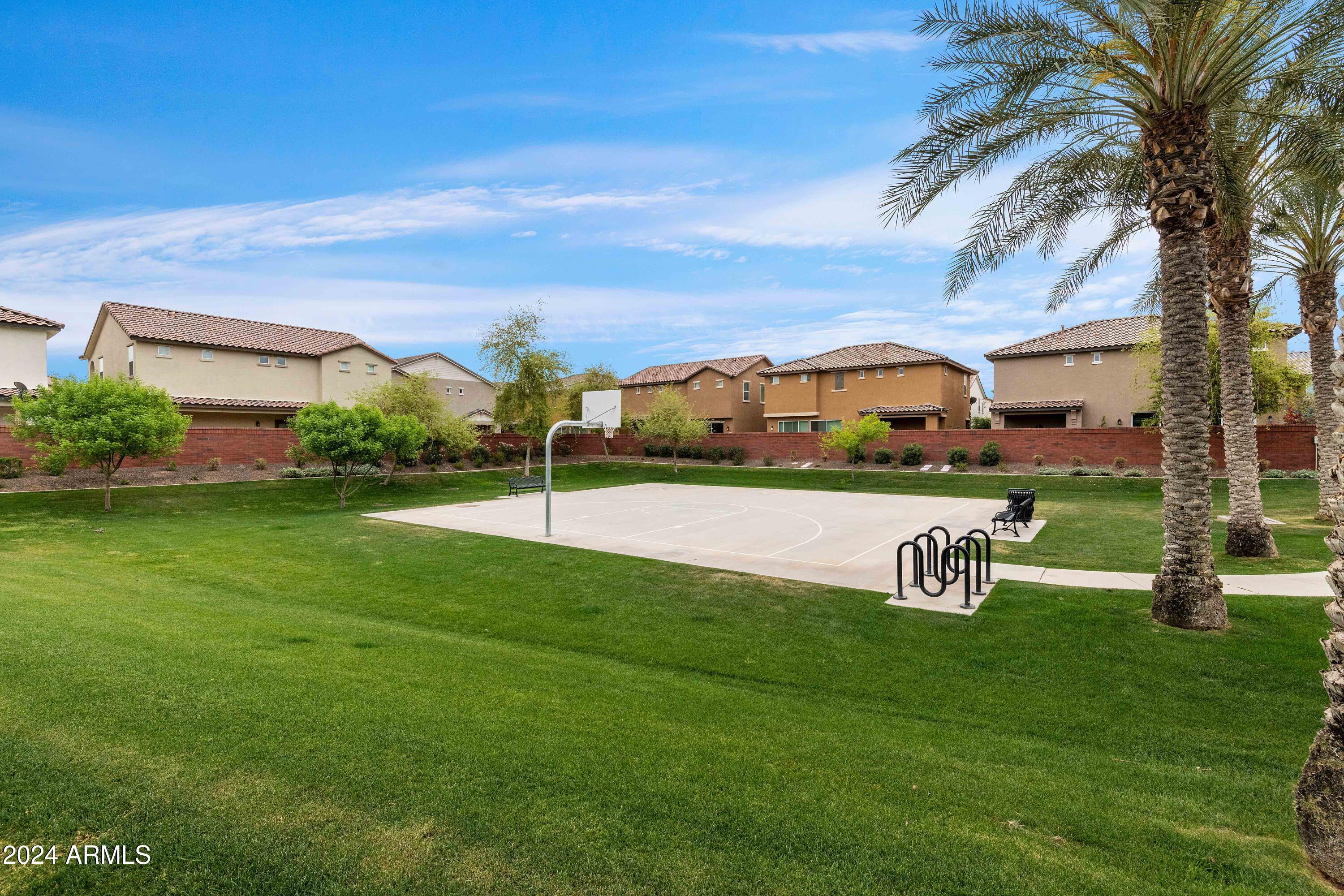 4232 East Tyson Street Gilbert, AZ 85295 - Photo 36 of 38 a view of house with garden and tall trees
