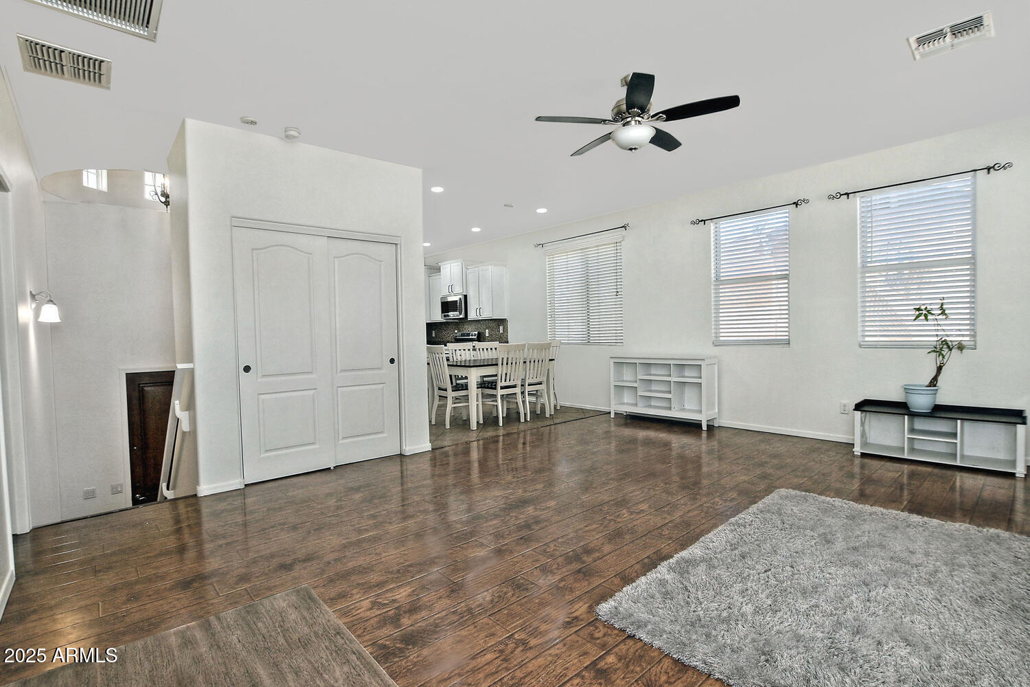 4232 East Tyson Street Gilbert, AZ 85295 - Photo 4 of 38 a living room with furniture and kitchen view