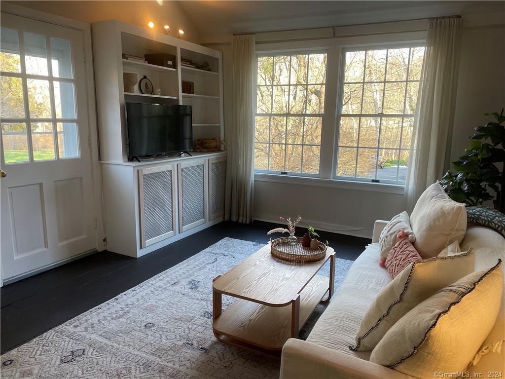 87 B Red Coat Road Westport, CT 06880 - Photo 15 of 17 a living room with furniture and a flat screen tv