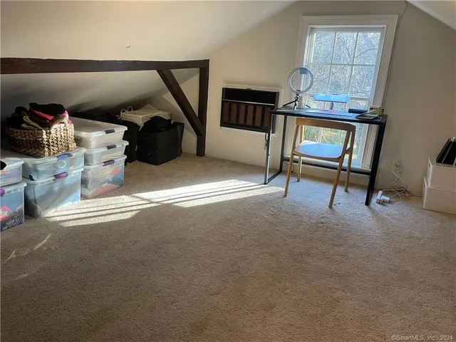 a view of livingroom with furniture and windows