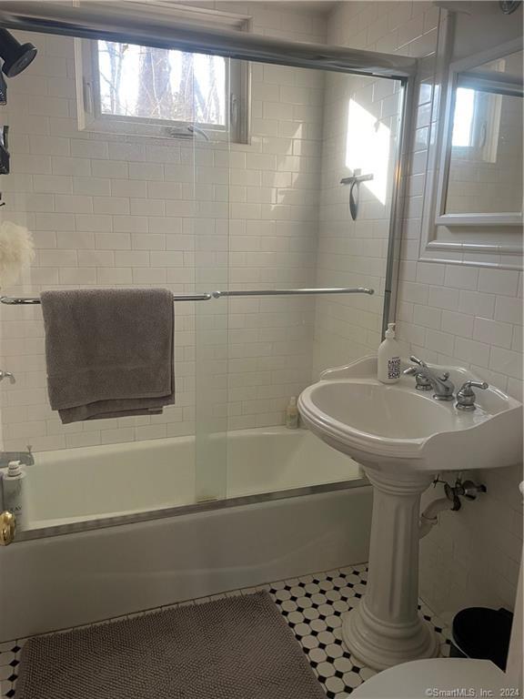 87 B Red Coat Road Westport, CT 06880 - Photo 6 of 17 a bathroom with a sink and a mirror