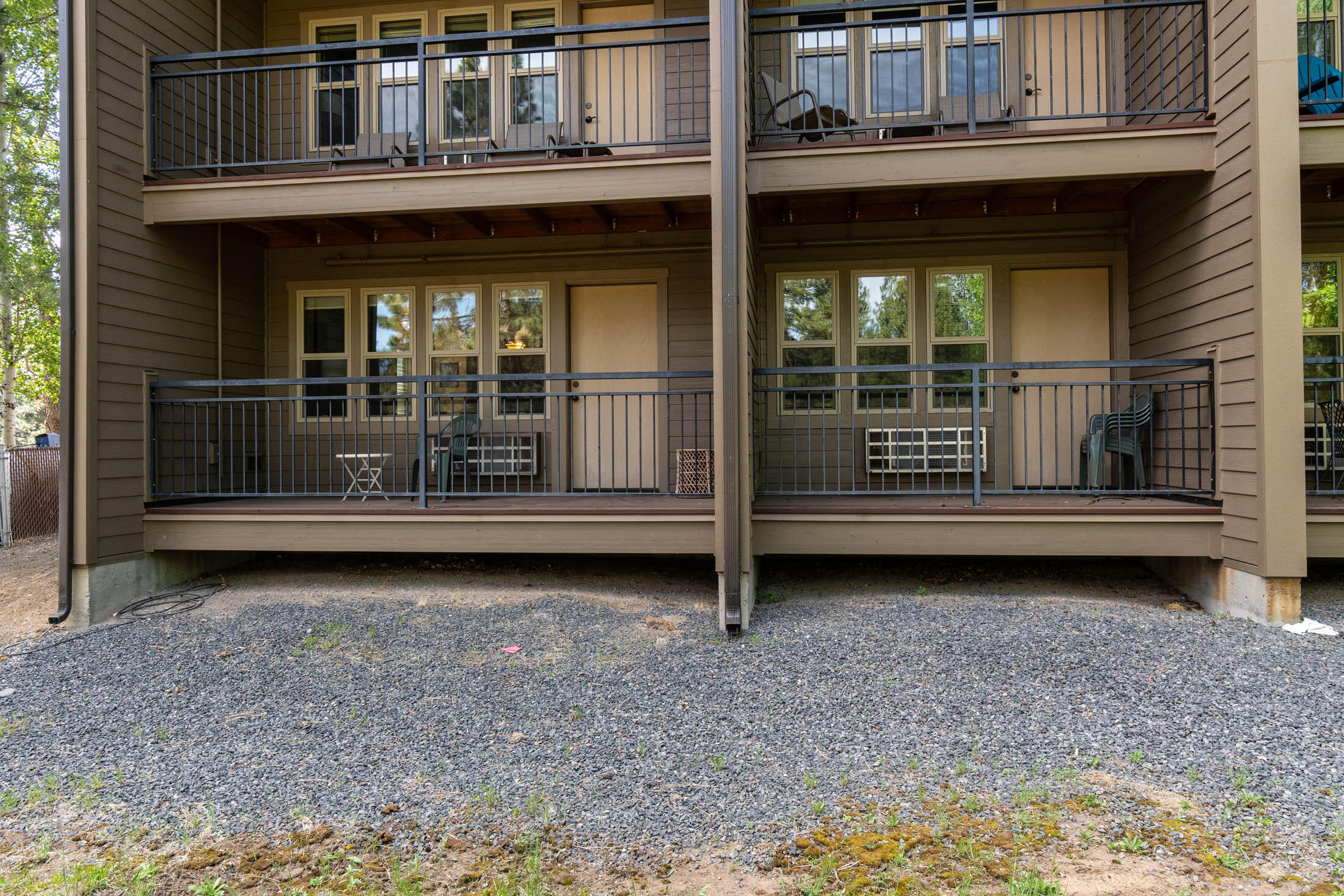 18575 Southwest Century Drive, Unit 2018 Bend, OR 97702 - Photo 15 of 32 a backyard of a house with barbeque area