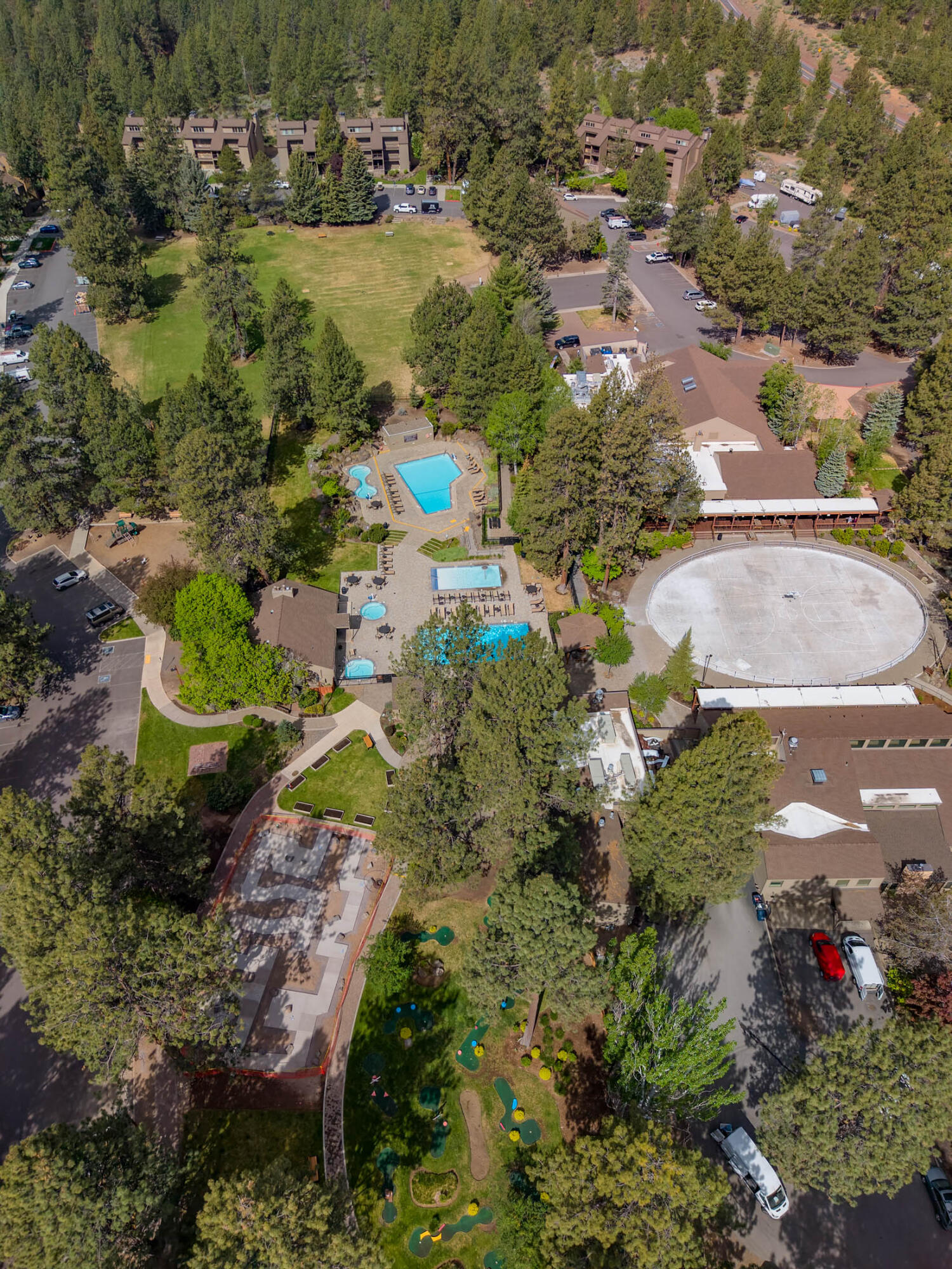18575 Southwest Century Drive, Unit 2018 Bend, OR 97702 - Photo 18 of 32 an aerial view of residential houses with outdoor space and trees