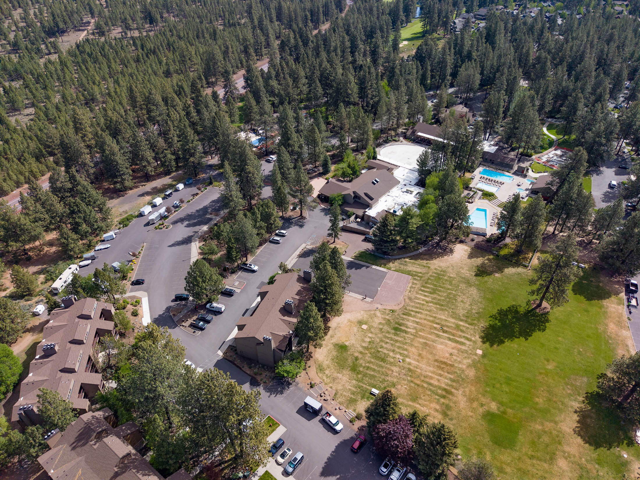 18575 Southwest Century Drive, Unit 2018 Bend, OR 97702 - Photo 24 of 32 an aerial view of residential houses with outdoor space