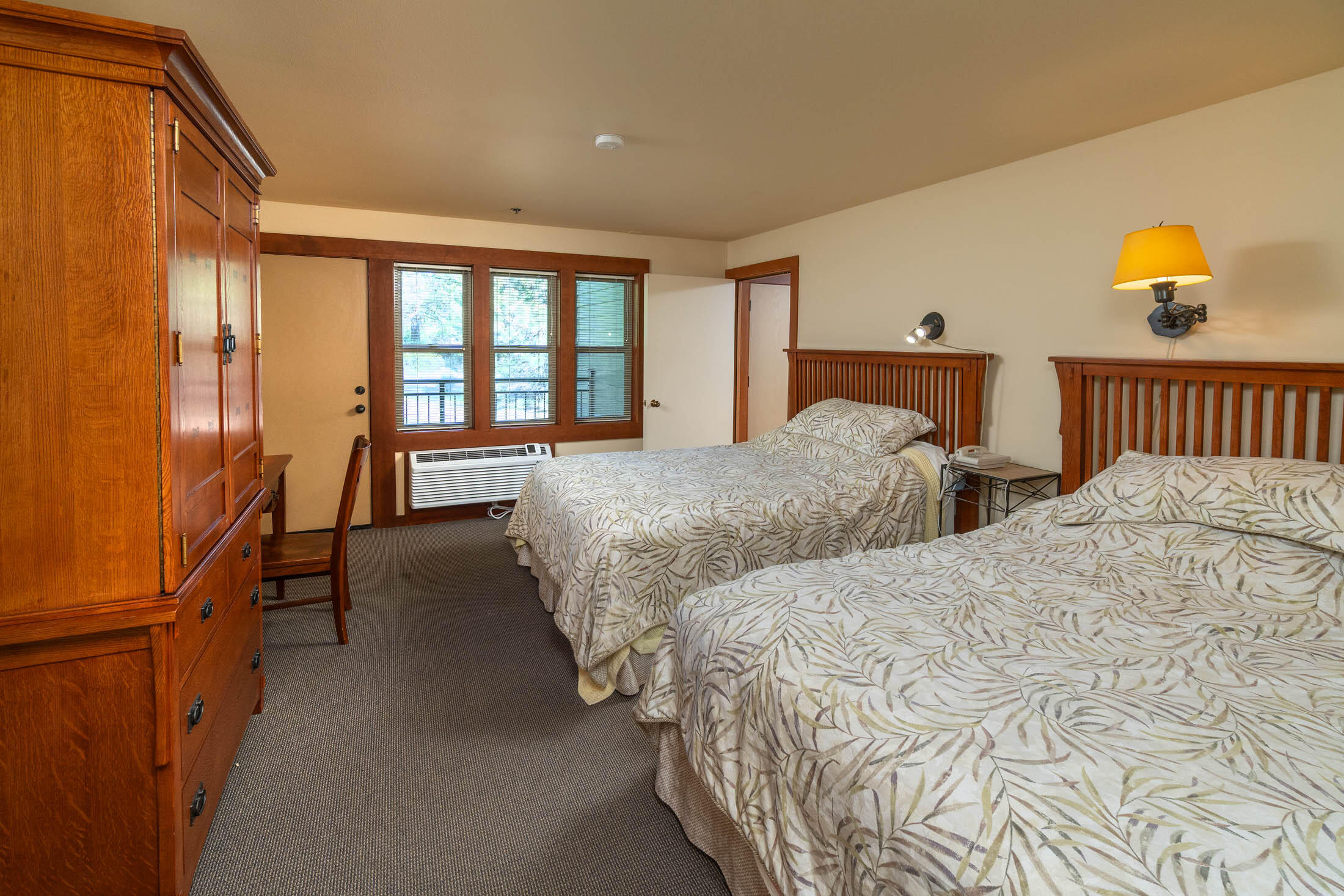 18575 Southwest Century Drive, Unit 2018 Bend, OR 97702 - Photo 8 of 32 a spacious bedroom with two beds and large windows