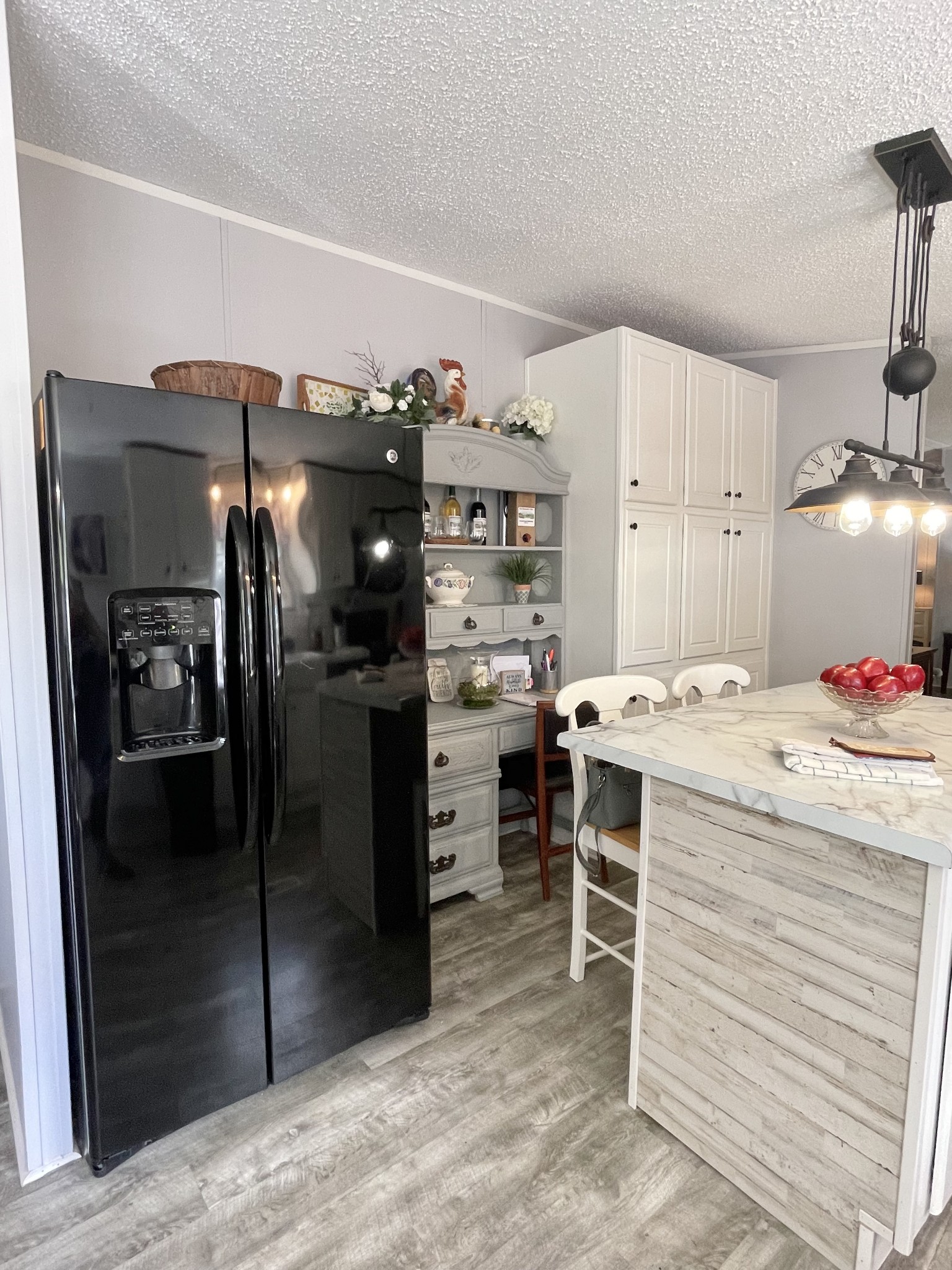 7593 Todd Road Westpoint, TN 38486 - Photo 8 of 41 a kitchen with a refrigerator and a stove