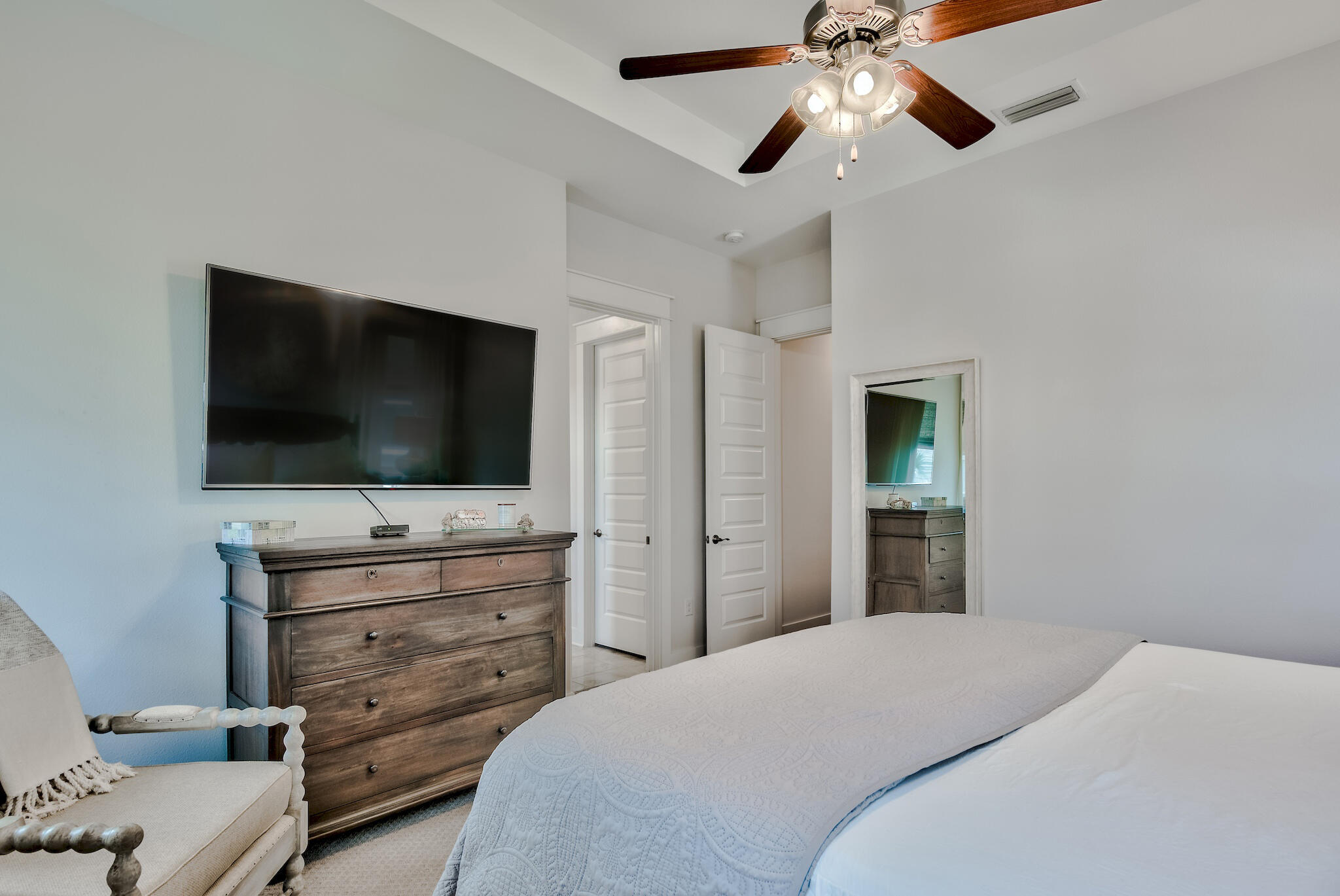 12 York Lane Inlet Beach, Unit A Inlet Beach, FL 32461 - Photo 14 of 59 a bedroom with a bed and a flat screen tv