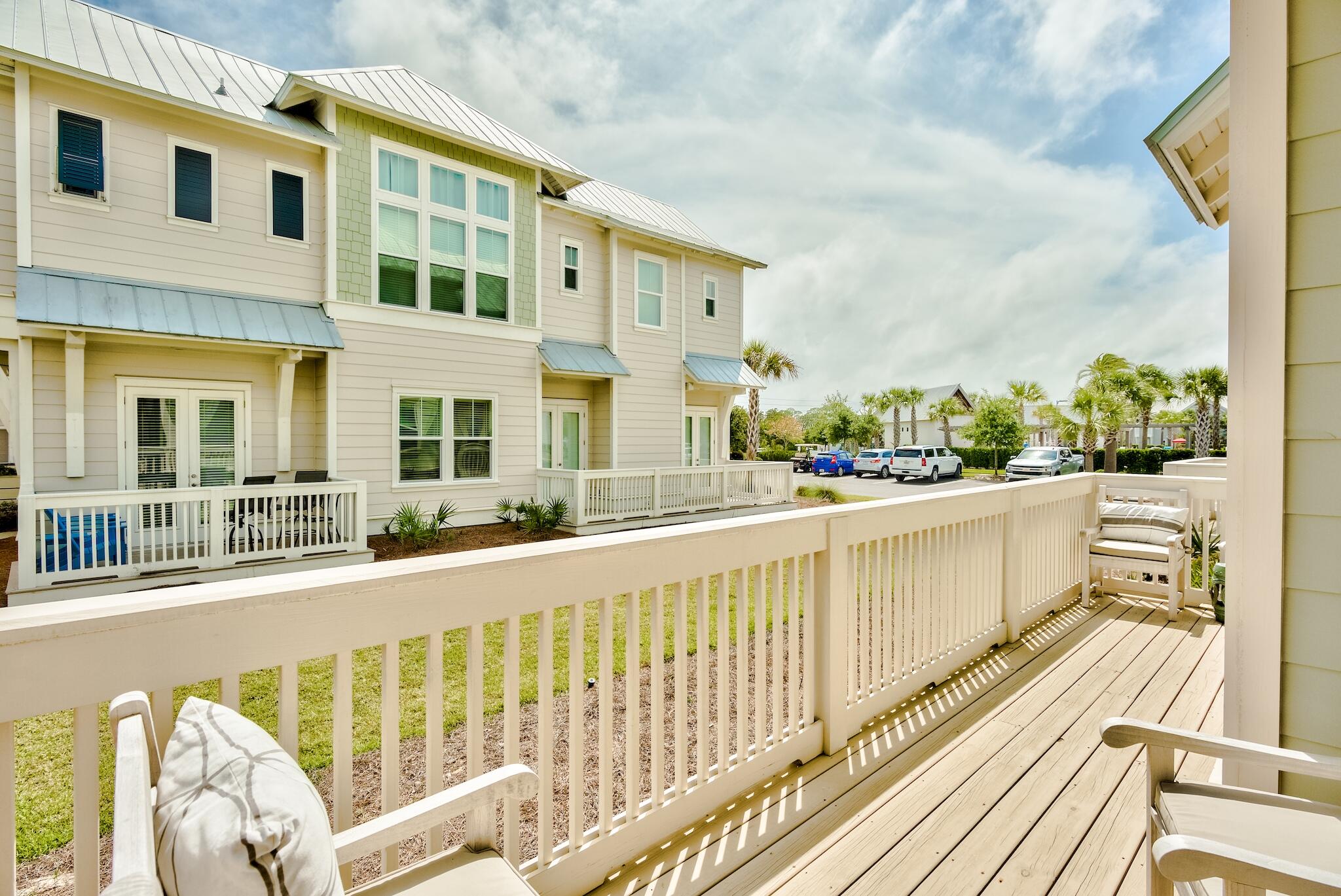 12 York Lane Inlet Beach, Unit A Inlet Beach, FL 32461 - Photo 26 of 59 a view of a balcony with wooden floor and fence