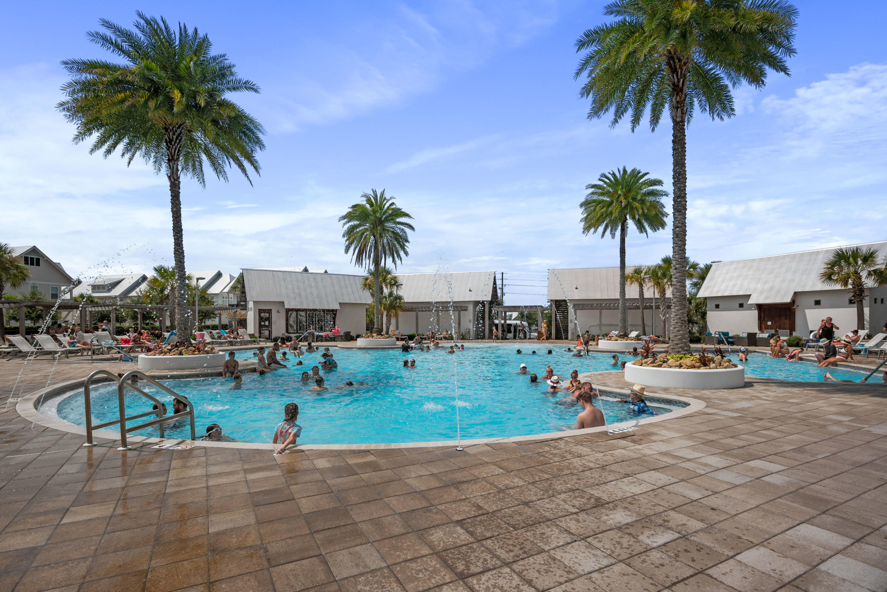 12 York Lane Inlet Beach, Unit A Inlet Beach, FL 32461 - Photo 29 of 59 a row of palm trees and swimming pool in the patio of a house