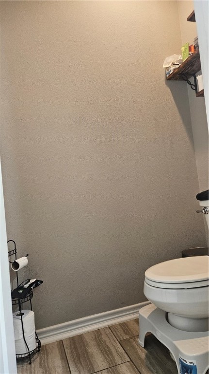 1051 Ocean Breeze Portland, TX 78374 - Photo 11 of 37 a bathroom with a toilet and a chair