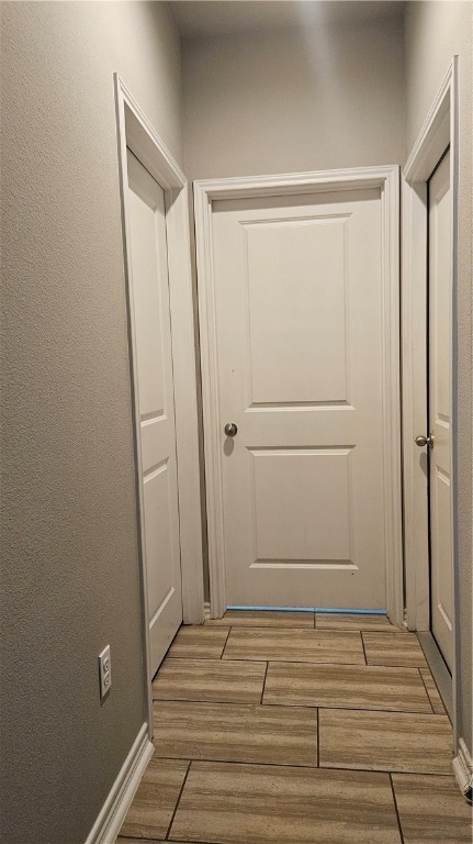 1051 Ocean Breeze Portland, TX 78374 - Photo 12 of 37 a view of a room with wooden floor and white walls
