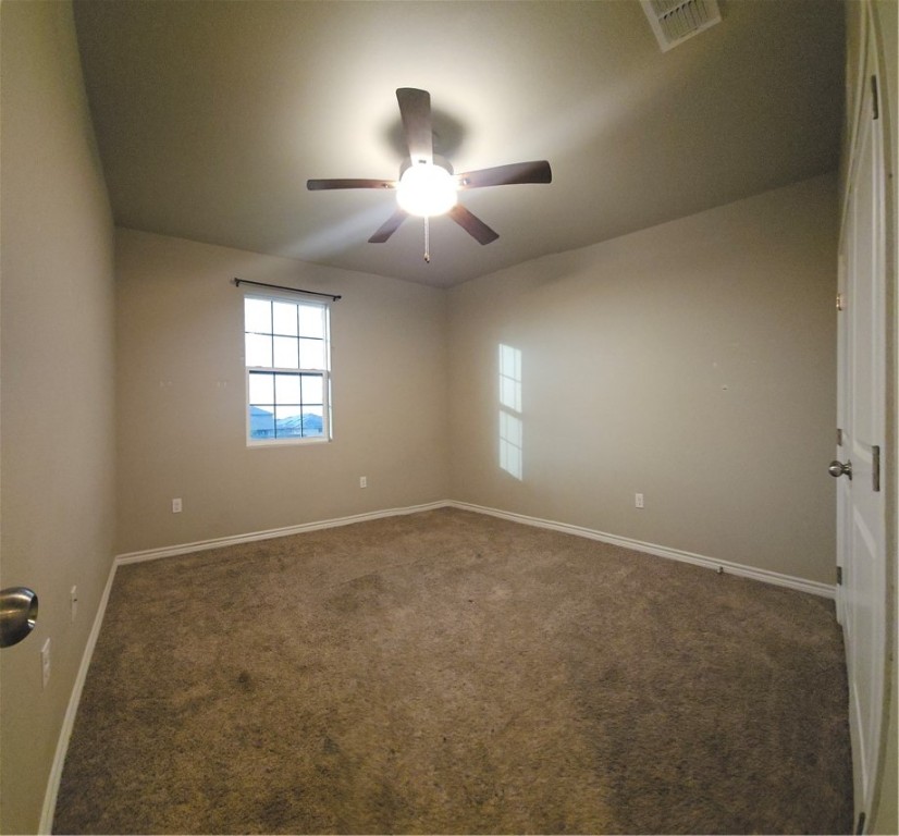 1051 Ocean Breeze Portland, TX 78374 - Photo 20 of 37 en view of an empty room with a window