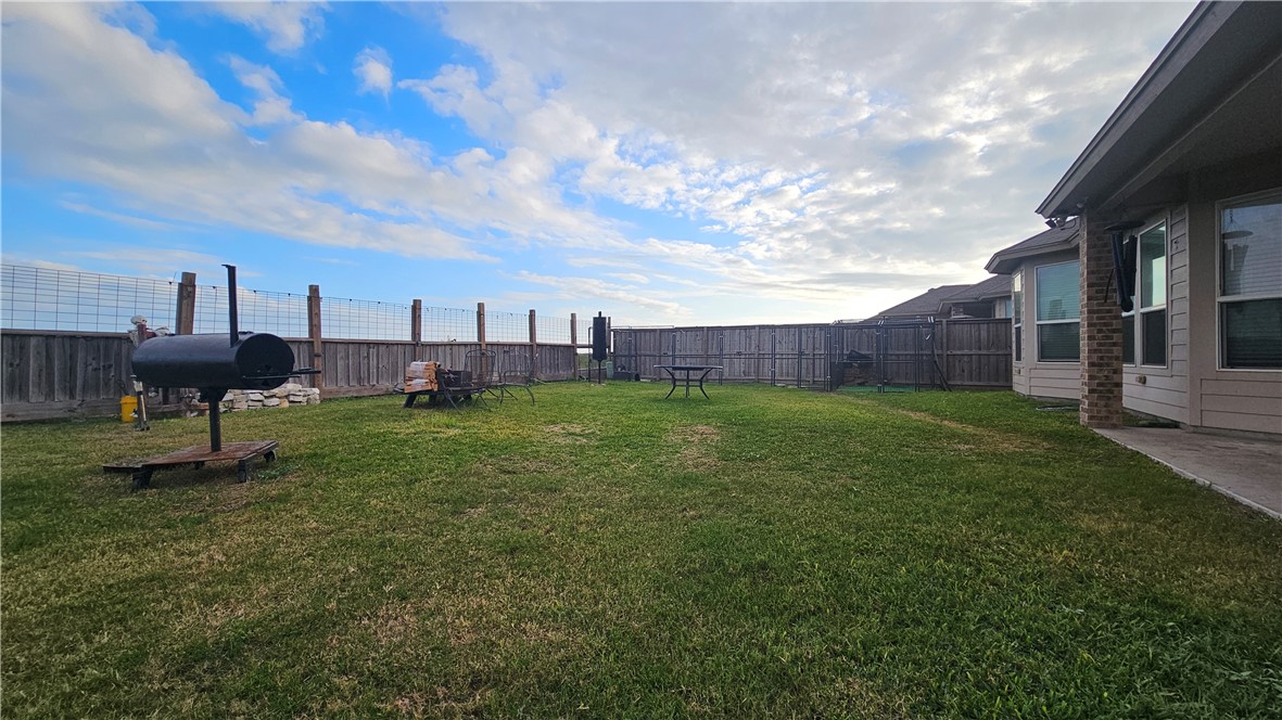 1051 Ocean Breeze Portland, TX 78374 - Photo 30 of 37 a view of a garden with a house in the background