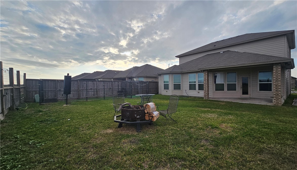 1051 Ocean Breeze Portland, TX 78374 - Photo 31 of 37 a front view of a house with garden