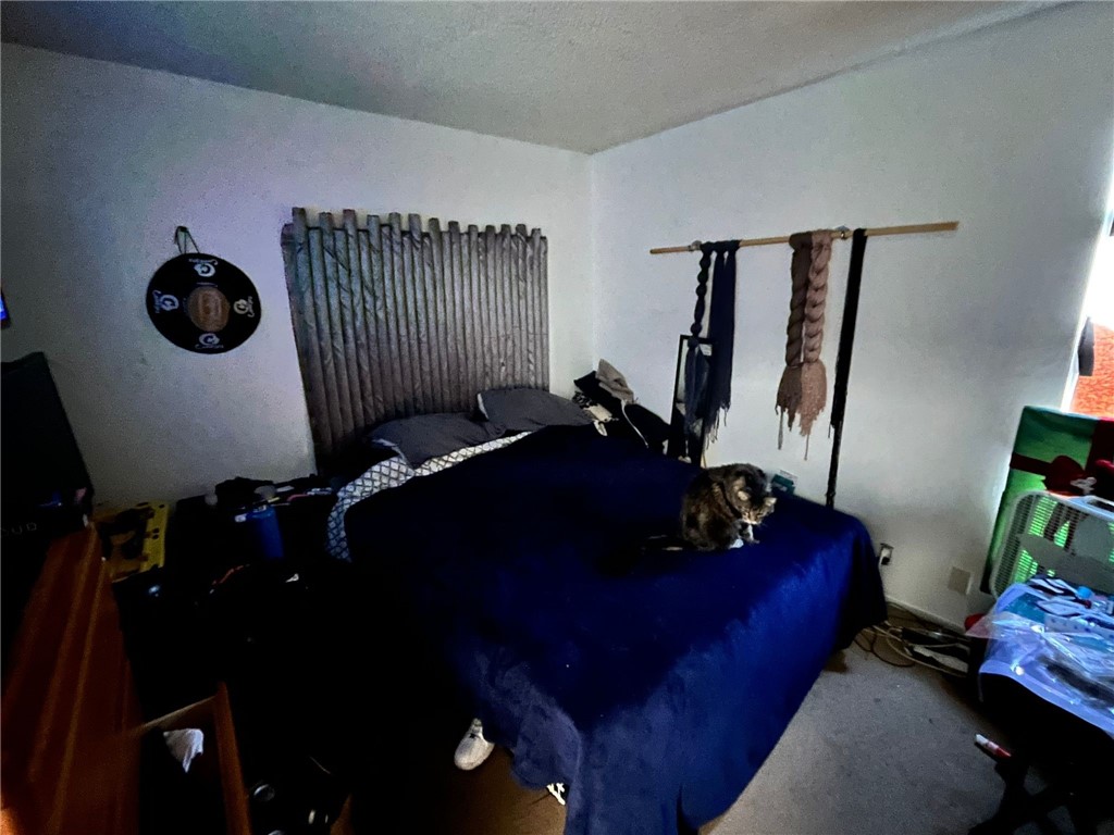 1731 Ellis Street, Unit 16 Concord, CA 94520 - Photo 14 of 20 a living room with furniture and a mirror