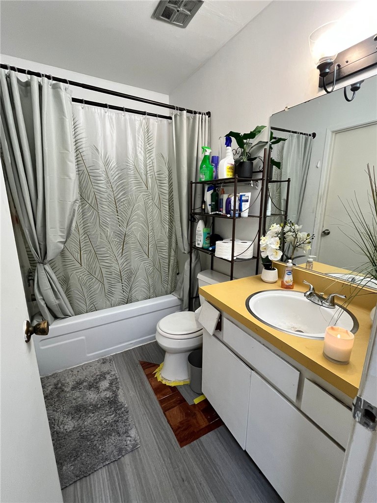 1731 Ellis Street, Unit 16 Concord, CA 94520 - Photo 15 of 20 a bathroom with a sink toilet and shower