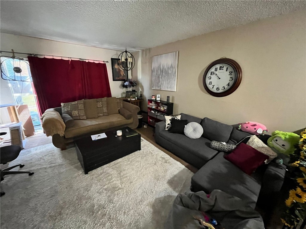 1731 Ellis Street, Unit 16 Concord, CA 94520 - Photo 7 of 20 a living room with furniture and a large window