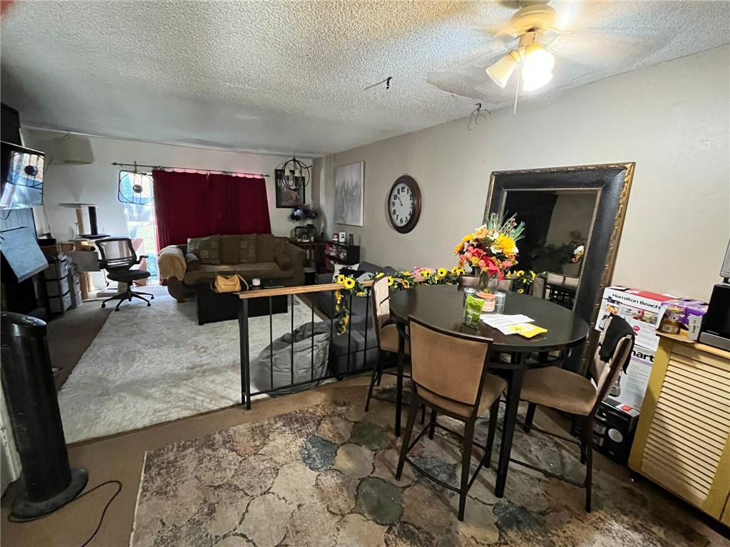 1731 Ellis Street, Unit 16 Concord, CA 94520 - Photo 10 of 20 a living room with furniture and a window