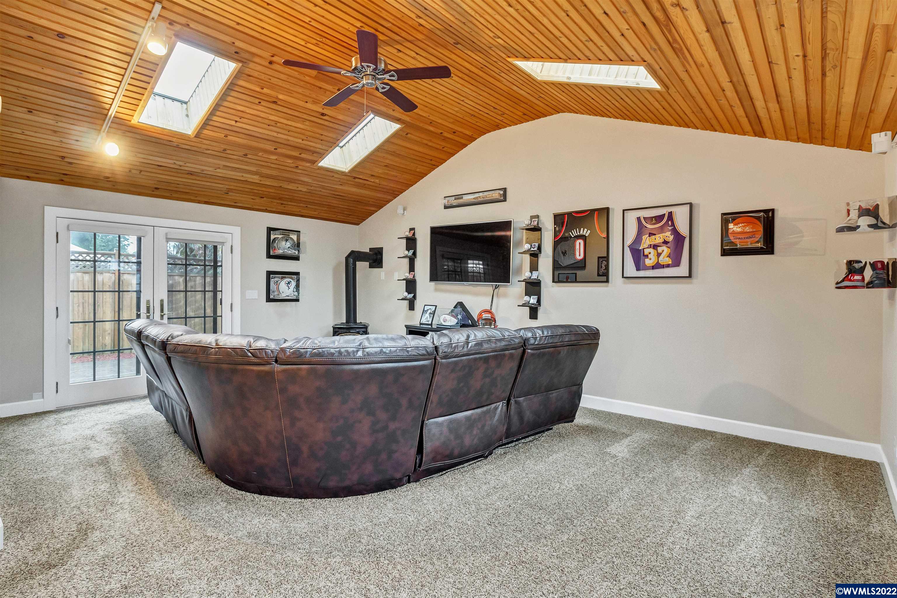 150 Edwards Road South Monmouth, OR 97361 - Photo 24 of 39 a living room with furniture and a flat screen tv