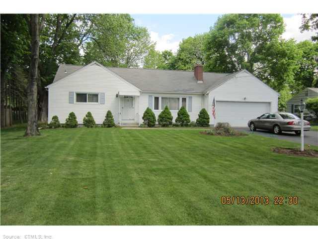 425 River Road Hamden, CT 06518 - Photo 1 of 1 a front view of a house with a garden