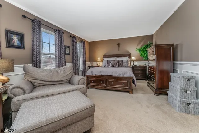 a bedroom with furniture and a fireplace