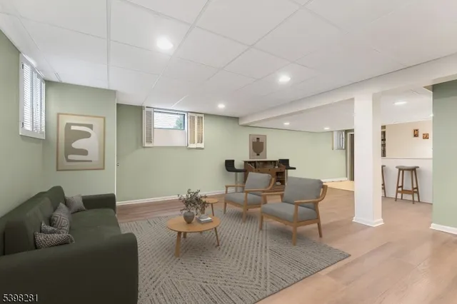 a kitchen with granite countertop a sink and a stove top oven