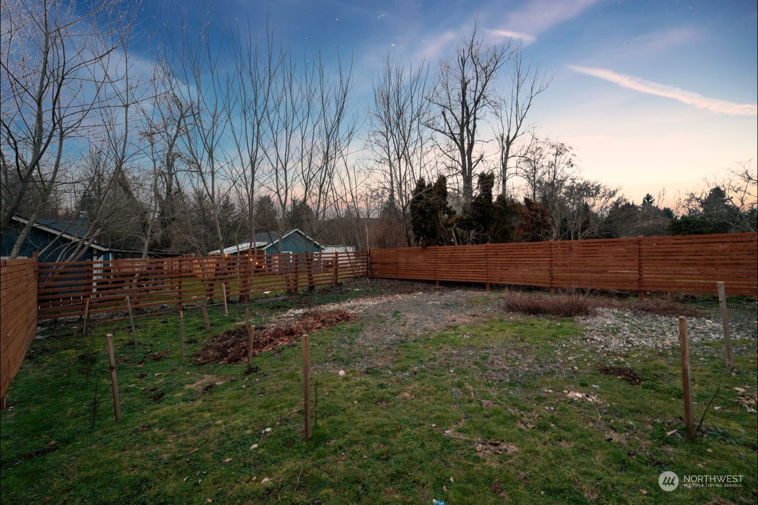 19528 22nd Avenue Southeast, Unit A Bothell, WA 98012 - Photo 29 of 33 a view of backyard with wooden fence