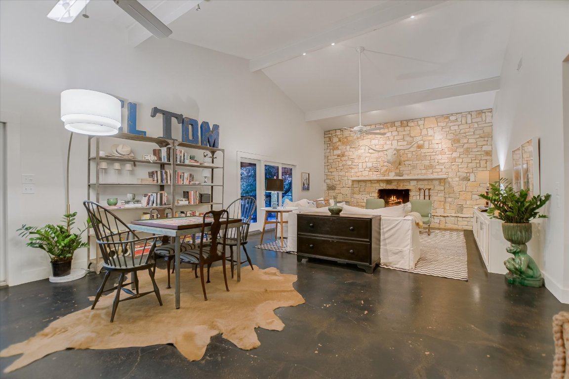 1121 Hidden Valley Road Wimberley, TX 78676 - Photo 11 of 40 a living room with furniture and a large window