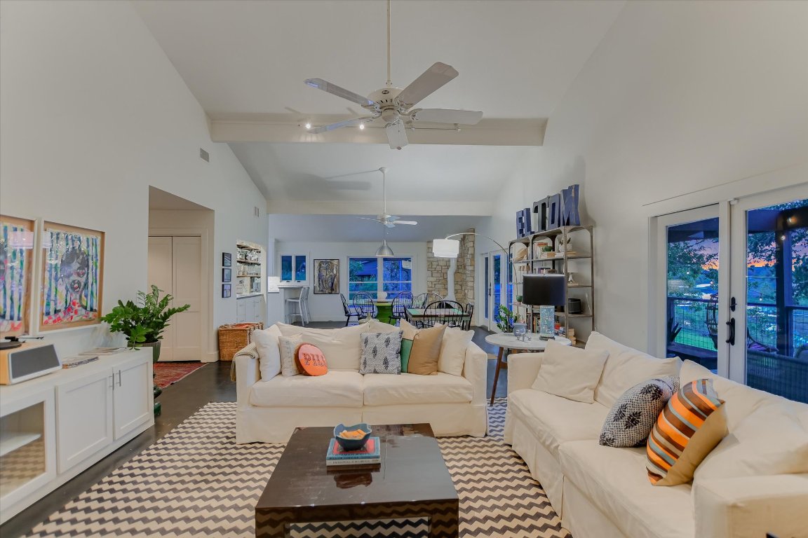 1121 Hidden Valley Road Wimberley, TX 78676 - Photo 12 of 40 a living room with furniture and a rug