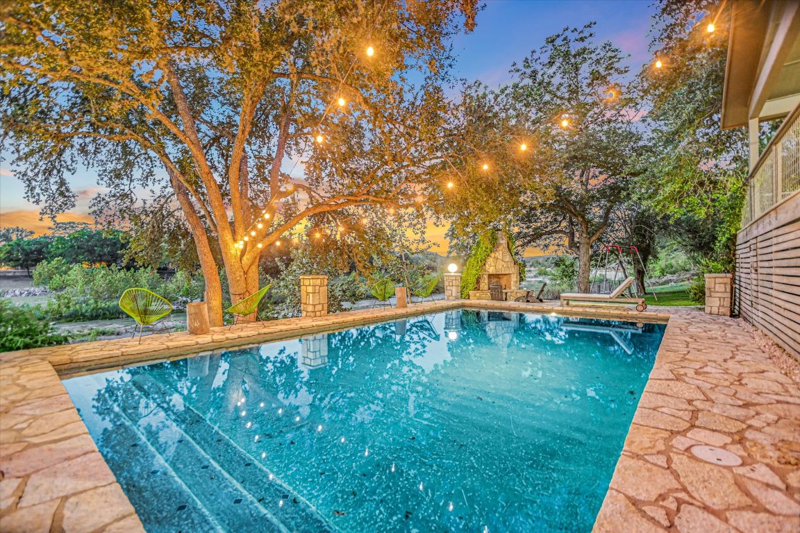 1121 Hidden Valley Road Wimberley, TX 78676 - Photo 3 of 40 a view of swimming pool with a yard