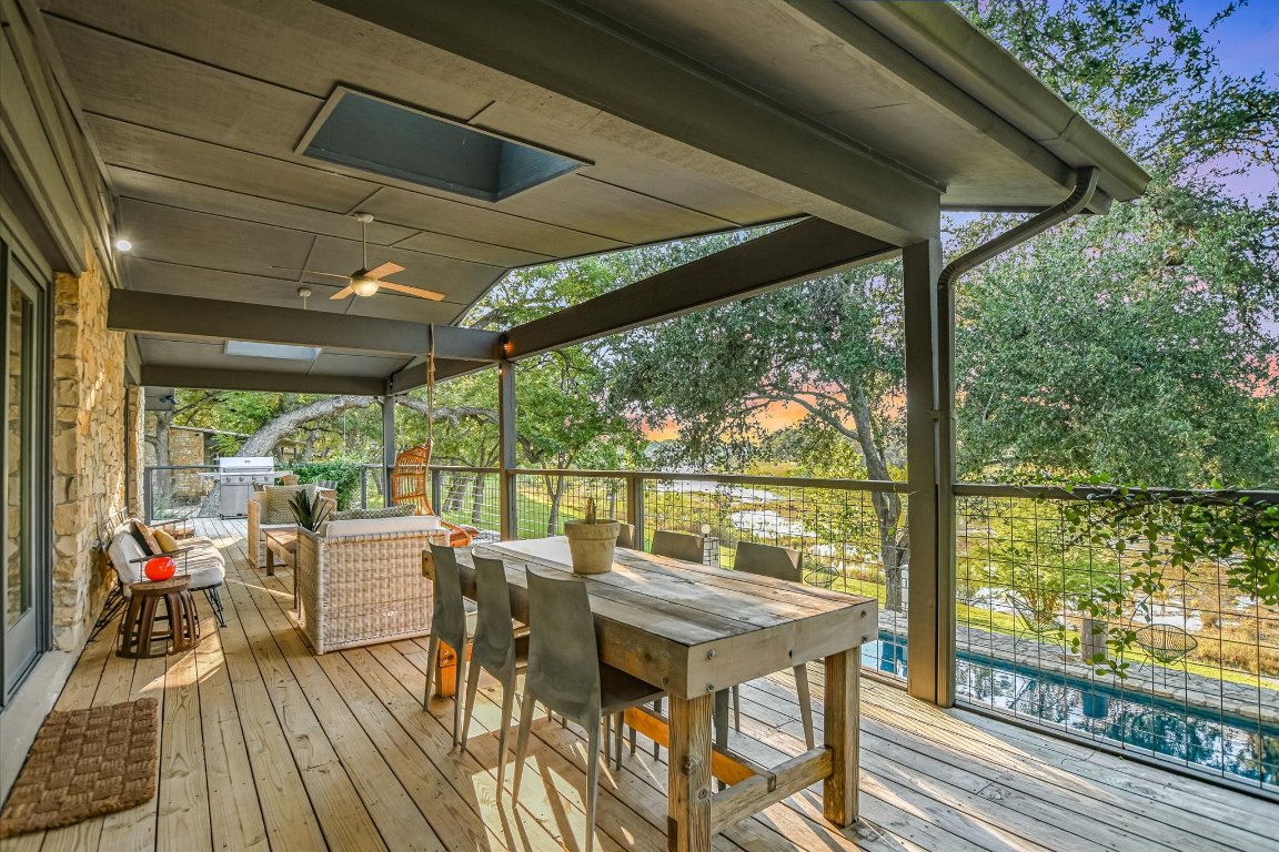 1121 Hidden Valley Road Wimberley, TX 78676 - Photo 9 of 40 a view of two chairs in the balcony