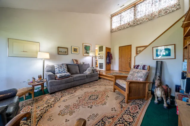 a kitchen with a refrigerator and a sink