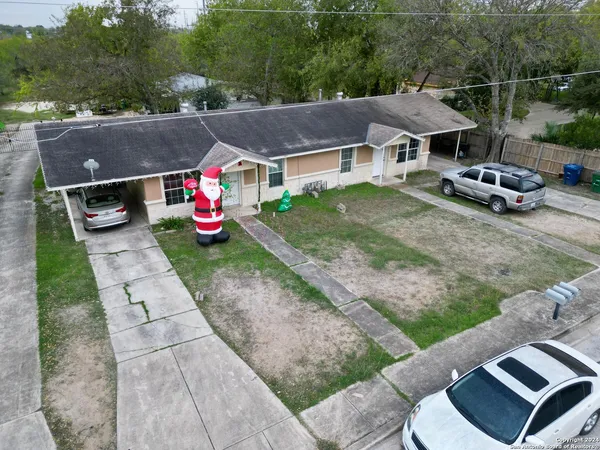 a aerial view of a house with garden