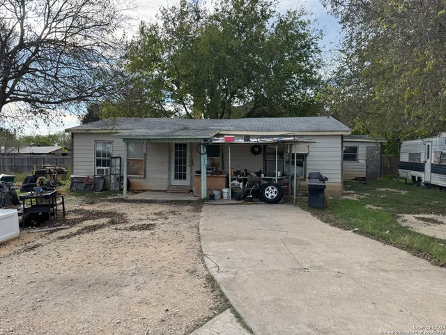 a view of a house with a patio