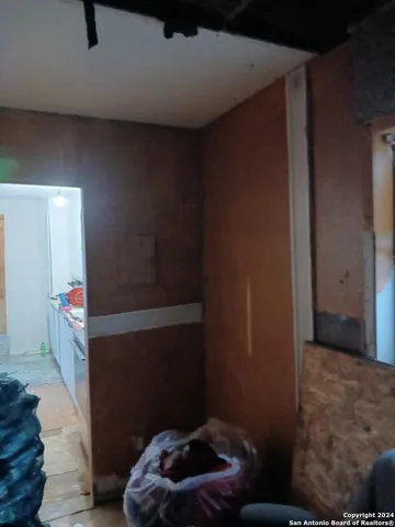 a room with furniture and a potted plant