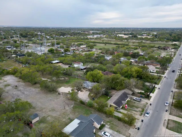 an aerial view of a city with lots of residential buildings