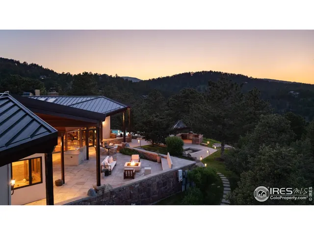 a balcony with furniture and a potted plant