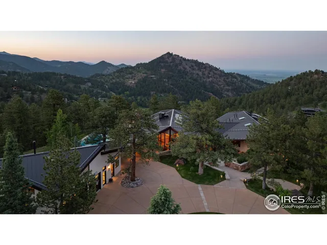 a view of a chairs and table on the wooden floor