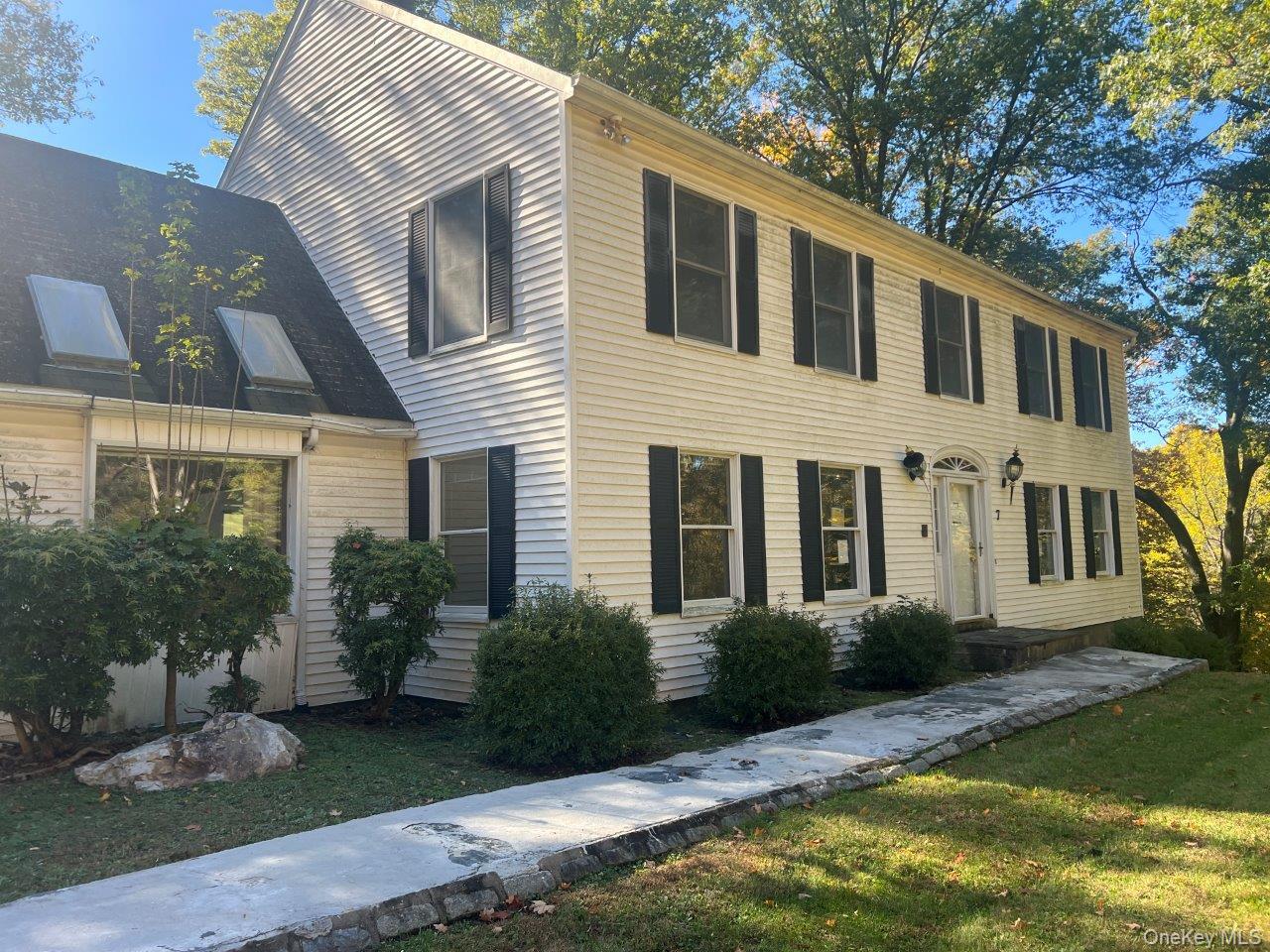 7 Felter Hill Road Monroe, NY 10950 - Photo 1 of 12 Colonial-style house with a front yard