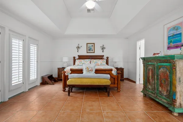 a bedroom with furniture and a fireplace