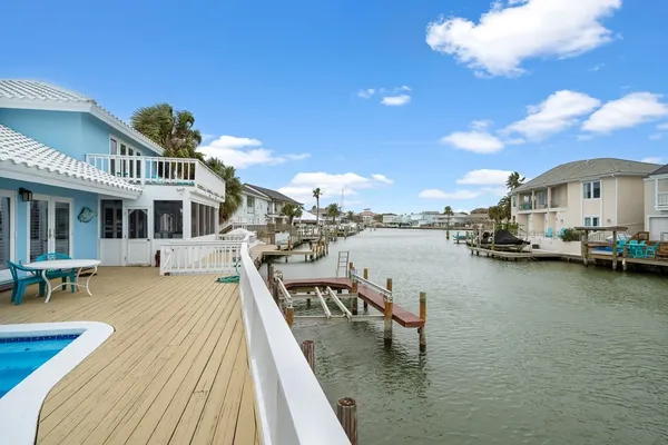 a view of a lake with a house