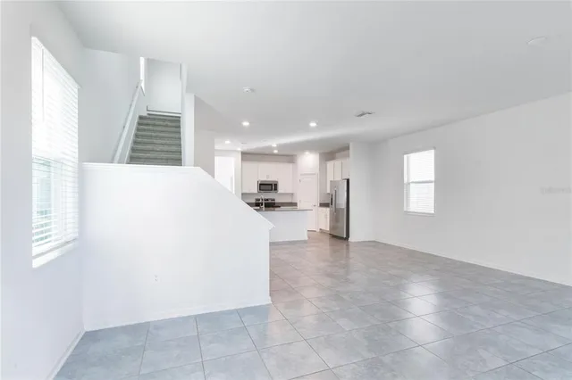 a view of a kitchen with furniture and a kitchen