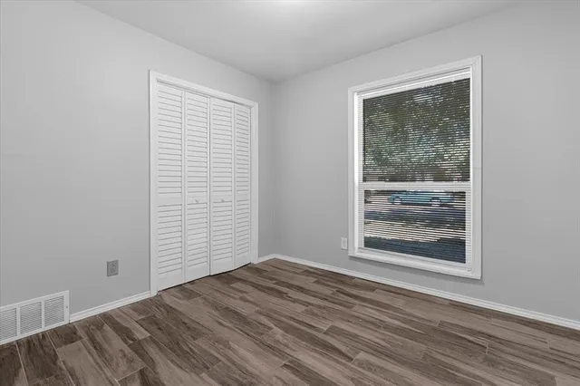 a view of a room that has a window