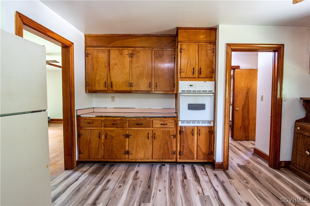 2400 East Hundred Road Chester, VA 23836 - Photo 12 of 27 a kitchen with stainless steel appliances granite countertop a refrigerator and a stove top oven