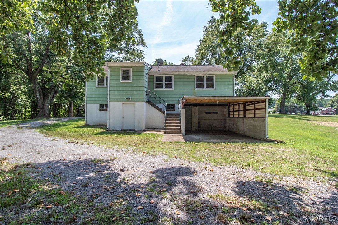 2400 East Hundred Road Chester, VA 23836 - Photo 26 of 27 a view of a house with backyard and tree