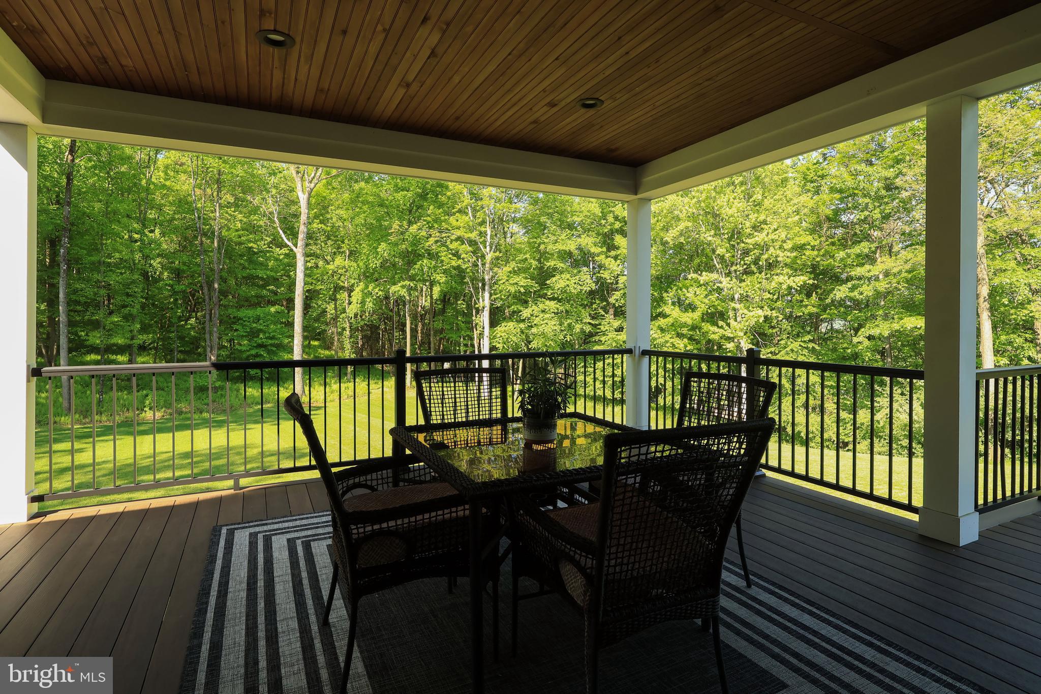 518 Two Mile Road Howard, PA 16841 - Photo 65 of 84 a view of a balcony with wooden floor